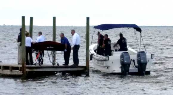 An unidentified body was discovered in the water off of Riveredge Drive in Titusville on Thursday afternoon. (Keelee Hadland image)