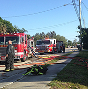 Fire Rescue Crews Work To Extinguish Blaze In A Residential Structure ...