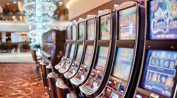 What is the difference between VLT and Slot Machines?