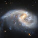 NASA Hubble Telescope Peers at Pair of Interacting Galaxies 160 Million Light-Years Away