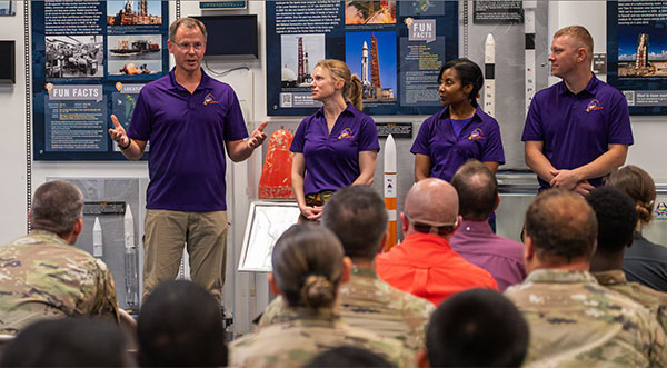 Space Force Guardian astronaut meets with launch support service members at Cape Canaveral