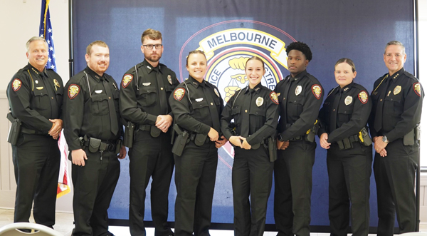 Melbourne Police Chief David Gillespie hosts the swearing-in ceremony for eight newly recruited officers